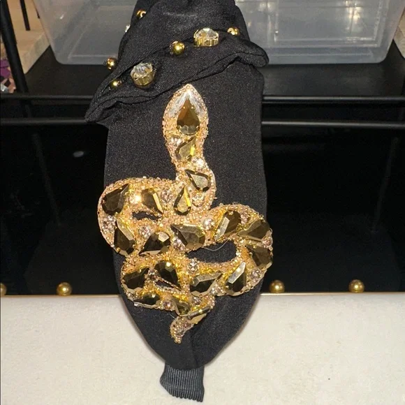 Chunky, Elegant Black Headband with Exaggerated, Gold Embellishments - Picture 3 of 5